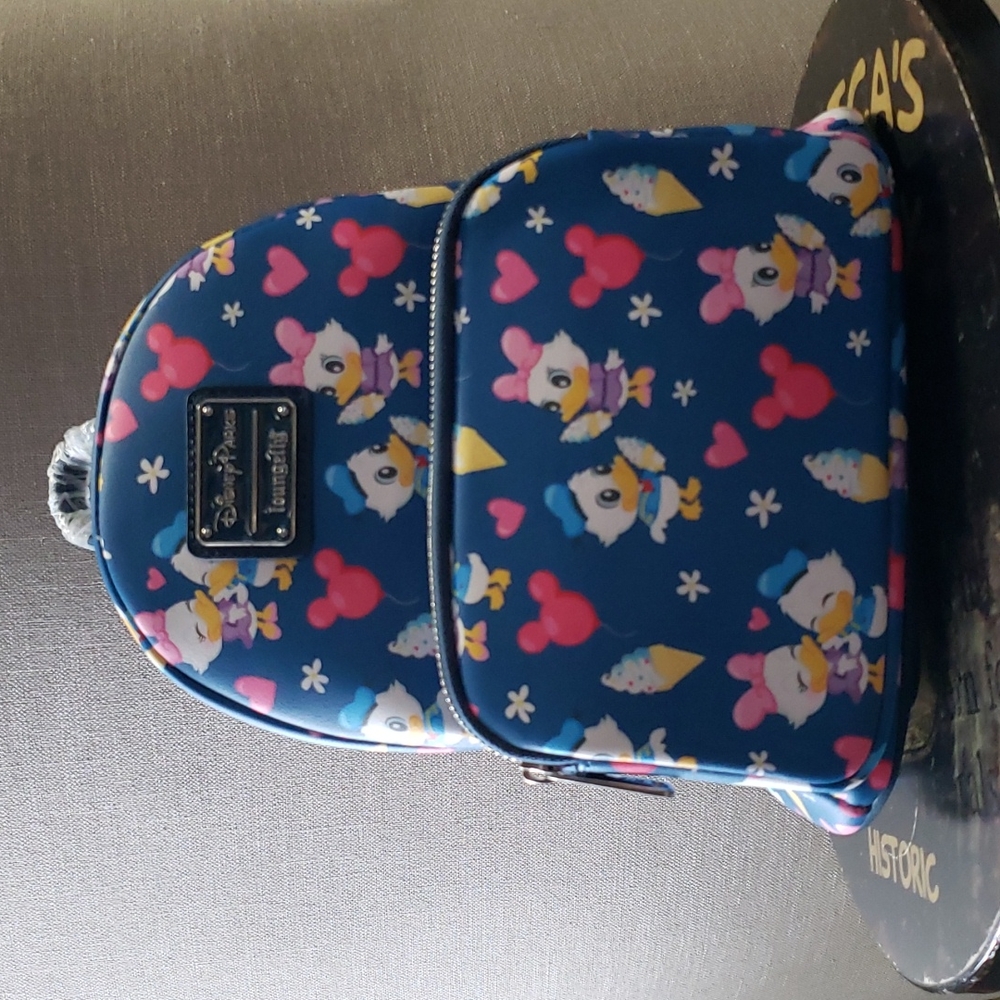 Donald and daisy loungfly mini backpack.